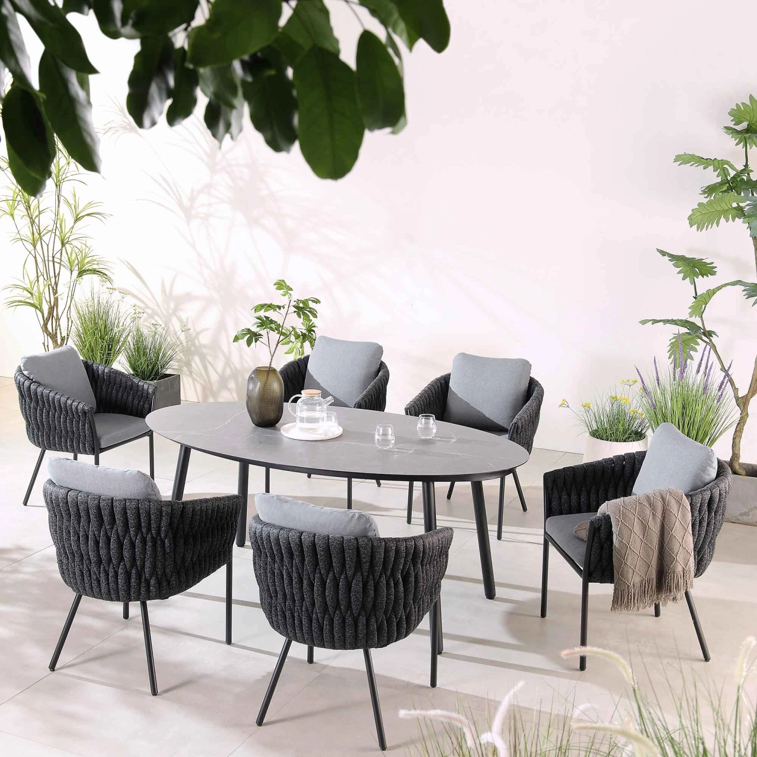 Montebello 6-Seater Outdoor Black Rope And Aluminium Oval Dining Set With Grey Ceramic Dining Table 3 Montebello 6-Seater Outdoor Black Rope And Aluminium Oval Dining Set With Grey Ceramic Dining Table